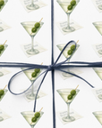 Wrapping Paper featuring a martini glass design and olives on a white background.