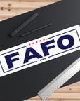 FAFO 2025 logo on a black surface with a ruler and pens.