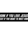 Black bumper sticker with white text on a white background
