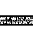 Black rectangular sticker with white text on a white background
