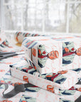 Romantic political wrapping paper roll a red roses and the script love written in background – perfect for Valentine's Day or anniversaries side