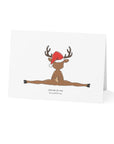 Card with a reindeer doing a split wearing a Santa hat on a white background