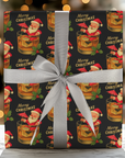 Santa’s Old Fashioned Christmas Wrapping Paper featuring retro Santa in a whiskey glass with holly and “Merry Christmas” text on a black background.