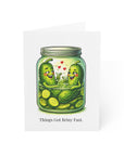 Card with illustration of pickles in a jar and text 'Things Got Briny Fast.' on a white background.
