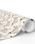 Roll of retro ghost wrapping paper featuring a ballerina ghost in a flowing sheet costume