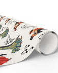 Roll of wrapping paper featuring couples dancing and musical notes on a light background.