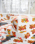 birthday wrapping paper in a retro theme featuring a bear and lion with balloons on a white background
