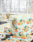 vintage bunny and duckling easter wrapping paper with pastel background