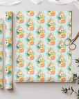vintage bunny and duckling easter wrapping paper with pastel background
