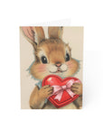 vintage style Illustration of a bunny holding a red heart with a pink bow on a beige background