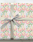 Spring wrapping paper with baby bunnies inside pink flowers and blue butterflies