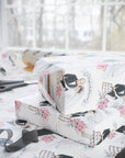 Retro wedding and bridal wrapping paper with a retro bride and groom cutting a wedding cake.