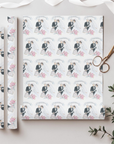 Retro wedding and bridal wrapping paper with a retro bride and groom cutting a wedding cake.