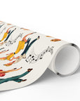 Roll of wrapping paper with colorful dancing figures and musical notes on a white background