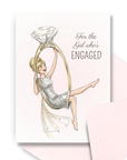 engagement greeting card with bride swinging from diamond ring illustration bride to be congratulations card with a coordinating pink envelope