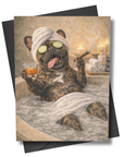 Greeting card with a dog in a spa setting holding a glass of whiskey and a cigar.