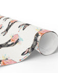 Roll of wrapping paper with french bulldog design on a white background