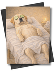 Card with a labrador dog relaxing in a spa setting, wearing eye masks.