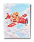 greeting card featuring a Pomeranian dog in a red airplane with hearts against a cloudy sky background