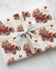 Gift wrapped in Valentine's Day-themed paper with bunnies and vintage cars with hearts floating in the background.