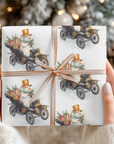 gifts wrapped under a tree in christmas wrapping paper that has a snowman driving a vintage model t