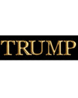 Gold 'TRUMP' text on a black background