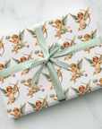 vintage cherub cupid wrapping paper with bows arrows and roses romantic gift wrap