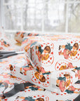 vintage valentine wrapping paper with retro boy and girl surrounded by hearts