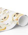 Vintage wedding wrapping paper roll featuring a retro bride and groom swinging on a golden wedding ring tied with a ribbon bow