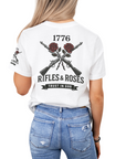 woman wearing a white t-shirt with 1776 Rifles & Roses Trust In God design on the back.