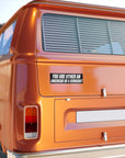 Orange van with a political bumper sticker on the back