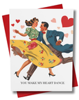 Valentine's Day card with vintage-style illustration of a couple dancing, surrounded by hearts and text that says 'you make my heart dance'