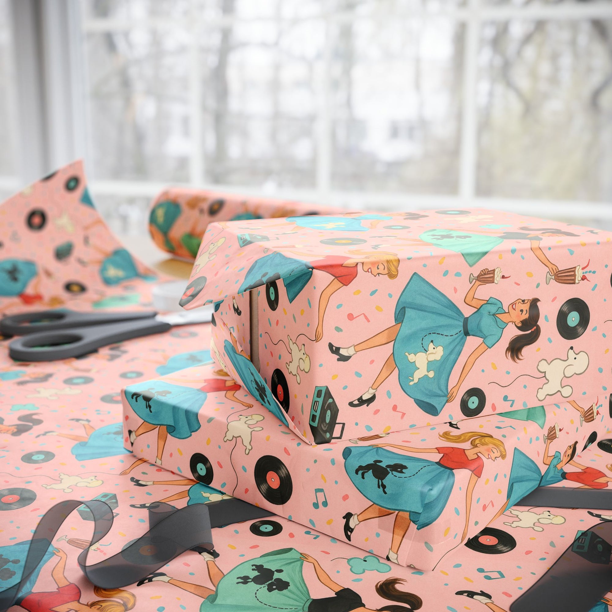Vintage rock and roll wrapping paper with records and milkshakes and girls in poodle skirts dancing, pink background with pastels side view