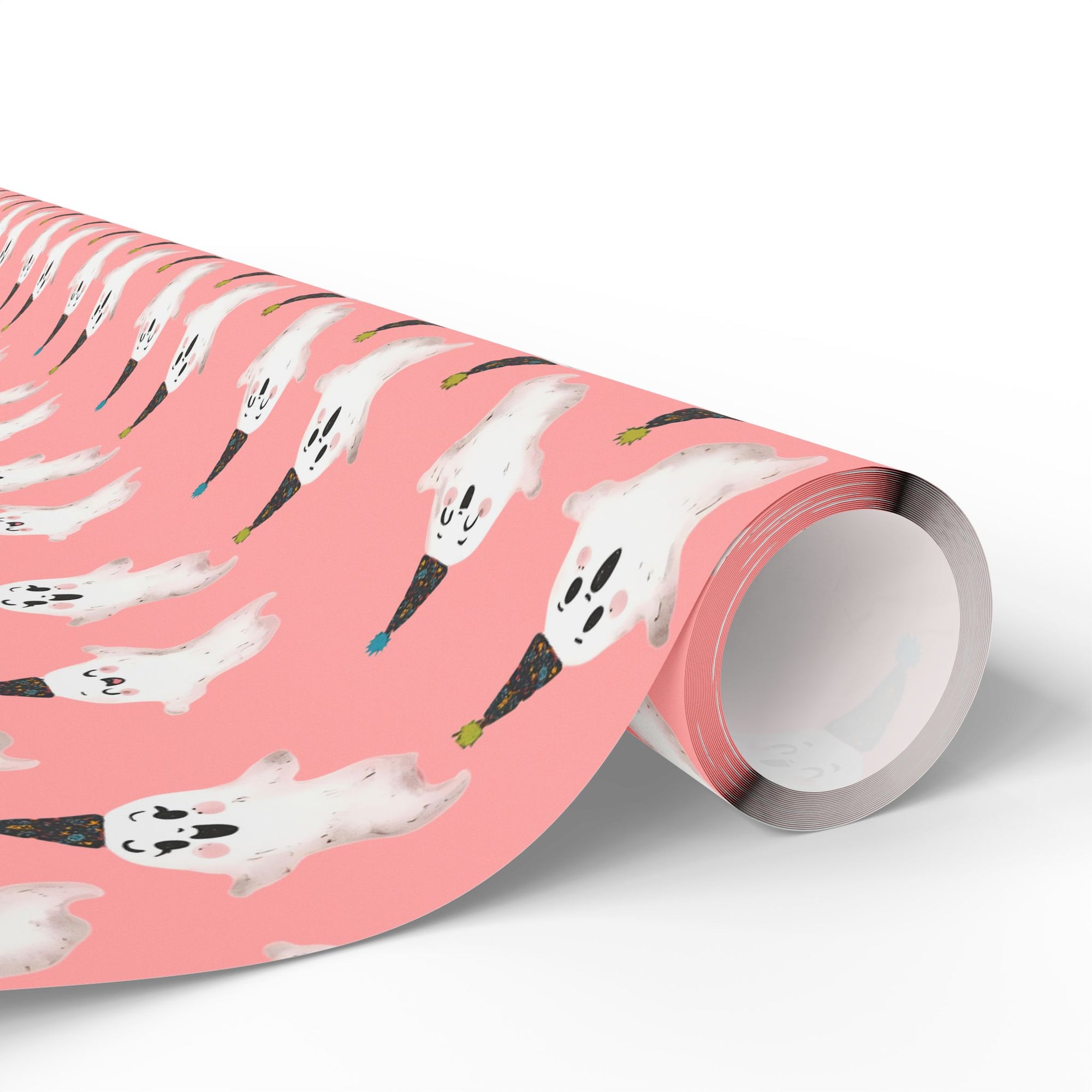Roll of pink wrapping paper with retro ghost with party hats.