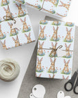 Gift boxes wrapped with bunny pattern with a blue gingham background