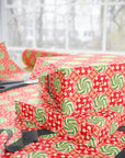 Christmas Candy Wrapping Paper with red and green peppermint swirl pattern