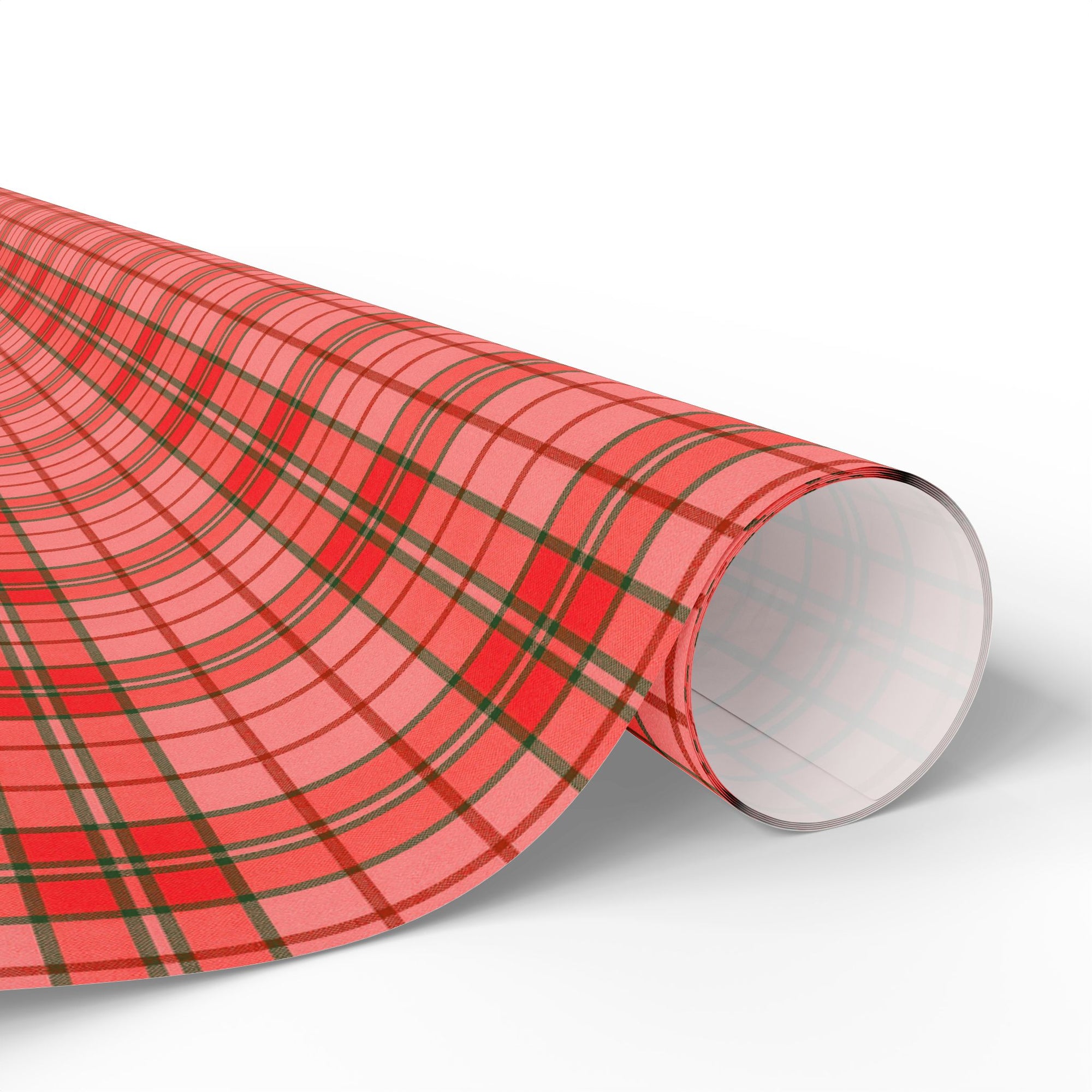 Roll of red plaid patterned paper on a white background