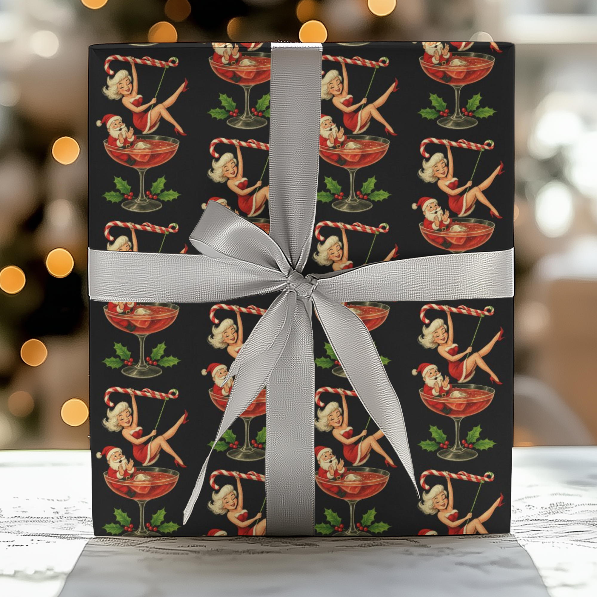 Christmas wrapping paper featuring a flirty 1950s Mrs. Claus dancing on a candy cane while Santa watches from his cocktail glass.