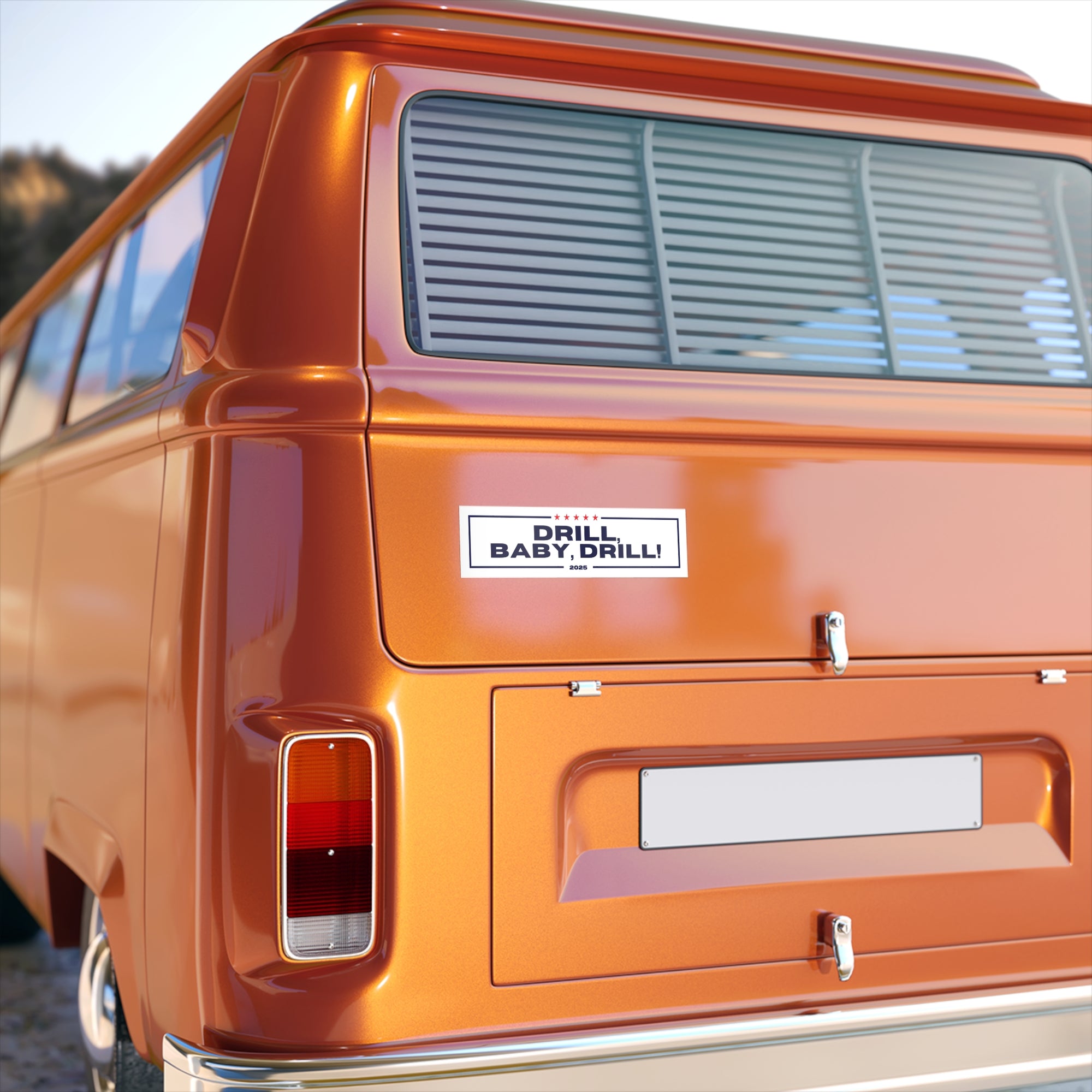 Orange van with a 'DRILL BABY DRILL!' sticker on the back