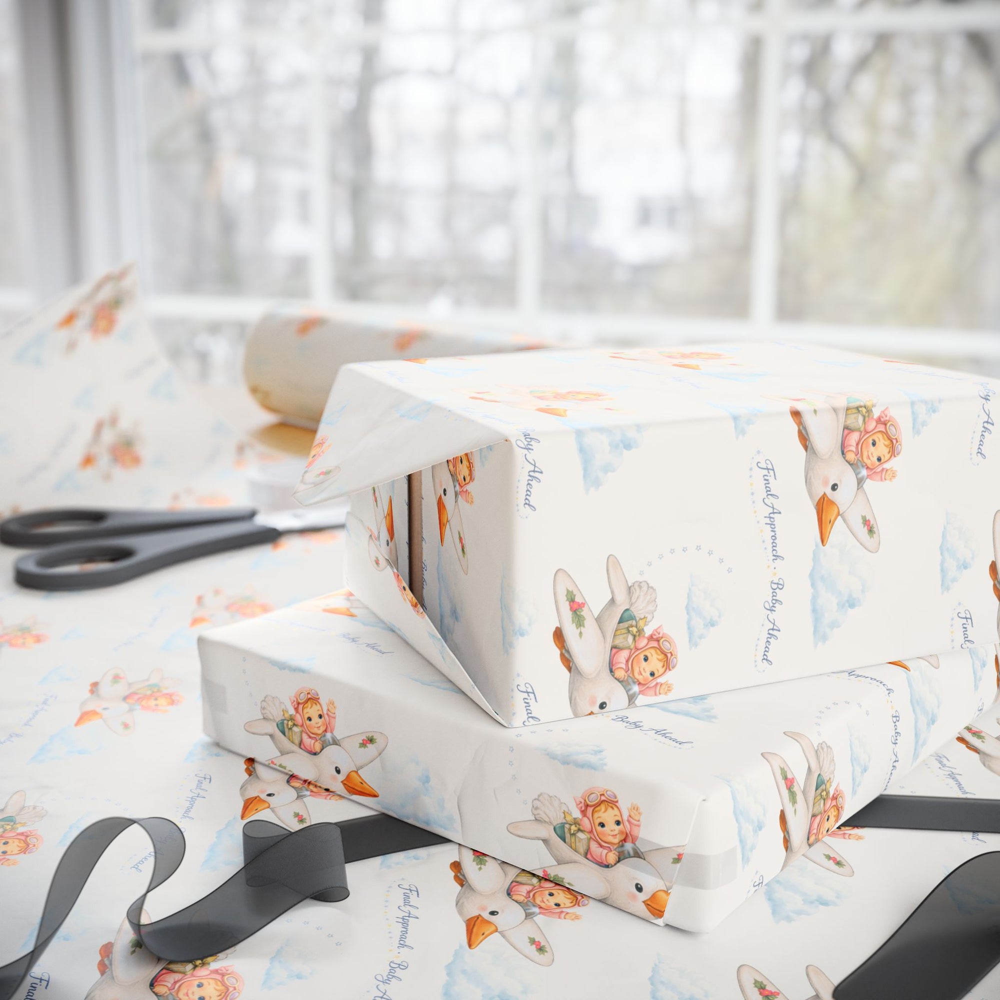 Gift boxes wrapped in paper with a vintage-style design featuring baby and stork, on a light background.