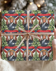 Gift box with Christmas-themed design featuring a potus portrait, trees, and usa flag, held by hands against a blurred festive background.