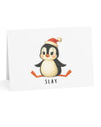 Card with a penguin wearing a Santa hat and the word 'SLAY' on a white background