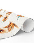 Roll of wrapping paper with Pomeranian pattern on a white background