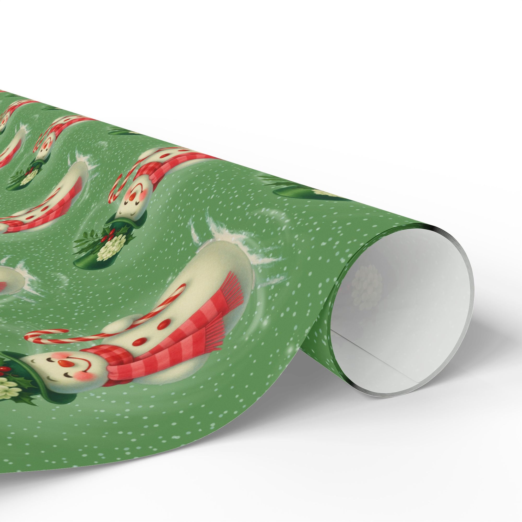 Green Christmas wrapping paper roll with snowmen and candy canes.