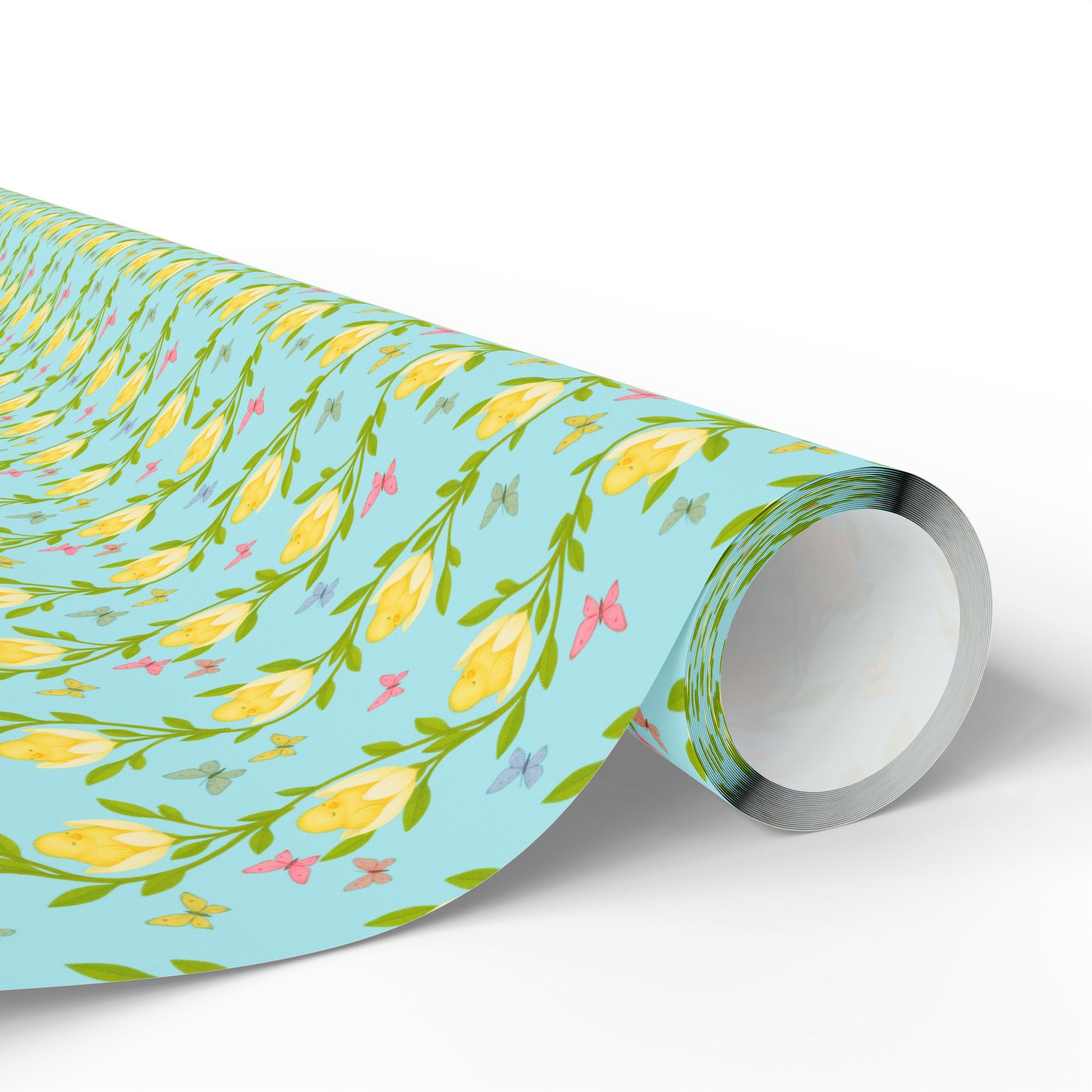 Spring wrapping paper with baby chicks nestled inside yellow flowers and butterflies on aqua background.
