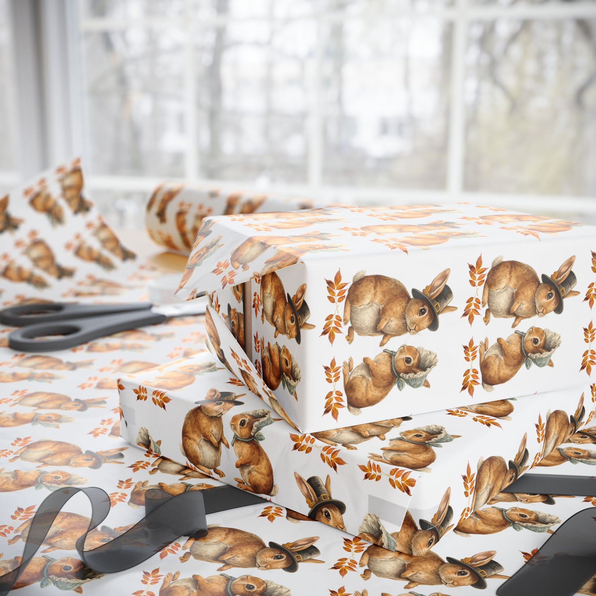 Roll of wrapping paper with bunnies dressed as pilgrims and leaf pattern on a white background.