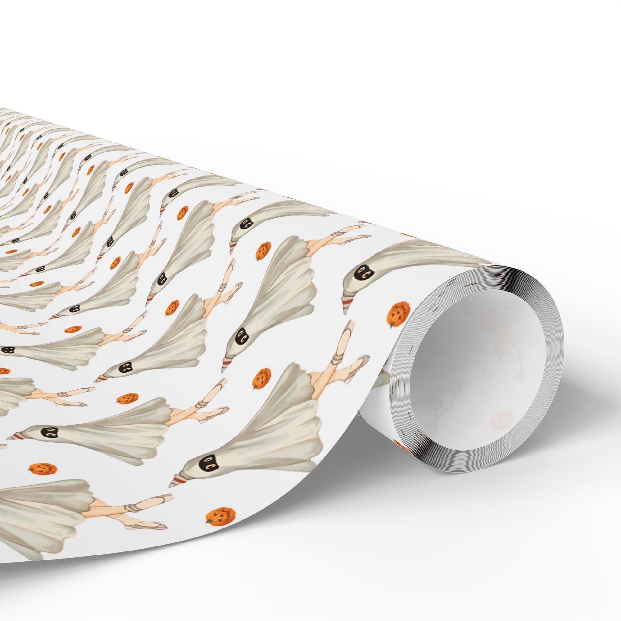Roll of retro ghost wrapping paper featuring a ballerina ghost in a flowing sheet costume
