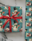 Christmas wrapping paper featuring a very patriotic snowman with a top hat holding an American flag.