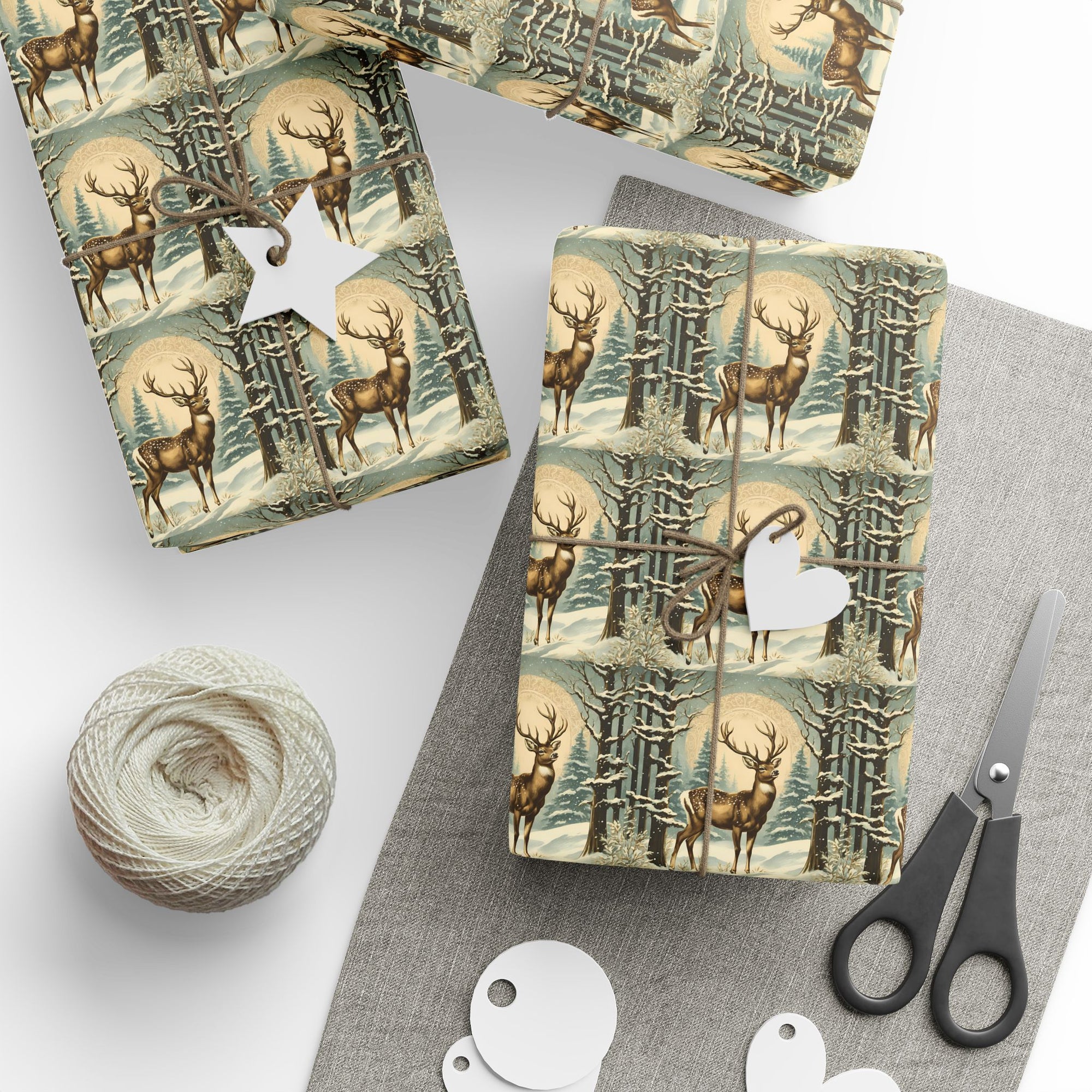 Christmas wrapping paper with reindeer in a winter forest theme laying on a table
