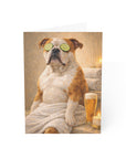 Funny card featuring an american bully with cucumbers on eyes, beer, and candle in a cozy setting